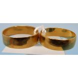 Two hallmarked 22ct gold wedding bands (