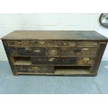 A 19thC pine haberdashery cabinet fitted