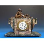 An Art Deco clock decorated with spelter