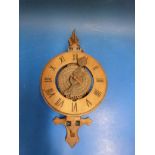 A wooden skeleton clock
