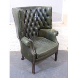 WITHDRAWN A pair of leather tub chairs a