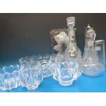 A collection of clear glass, including a