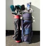 Two sets of golf clubs to include a "Pin