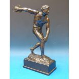 A spelter figure of a discus thrower on