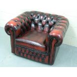 A leather Chesterfield club armchair