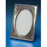 A hallmarked silver photograph frame, he