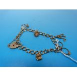 A yellow metal charm bracelet marked 9ct