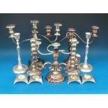 A quantity of various plated candelabra