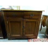 A 19th century cupboard fitted two drawe