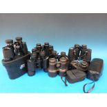 Nine various binoculars, some with cases