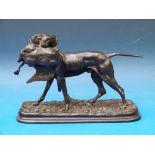 A cast bronze of a hunting hound with a