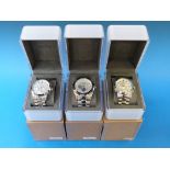 Three DKNY chronograph wristwatches on s