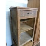 A rustic kitchen cupboard with single dr