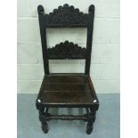 An antique oak peg jointed chair with th