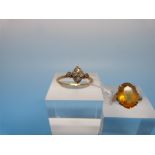 A 9ct gold ring set with a citrine (size