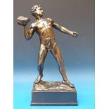 A spelter figure of a shot putter on a r