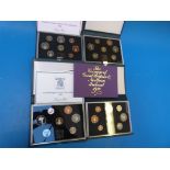 Four sets of Royal Mint cased proof UK c