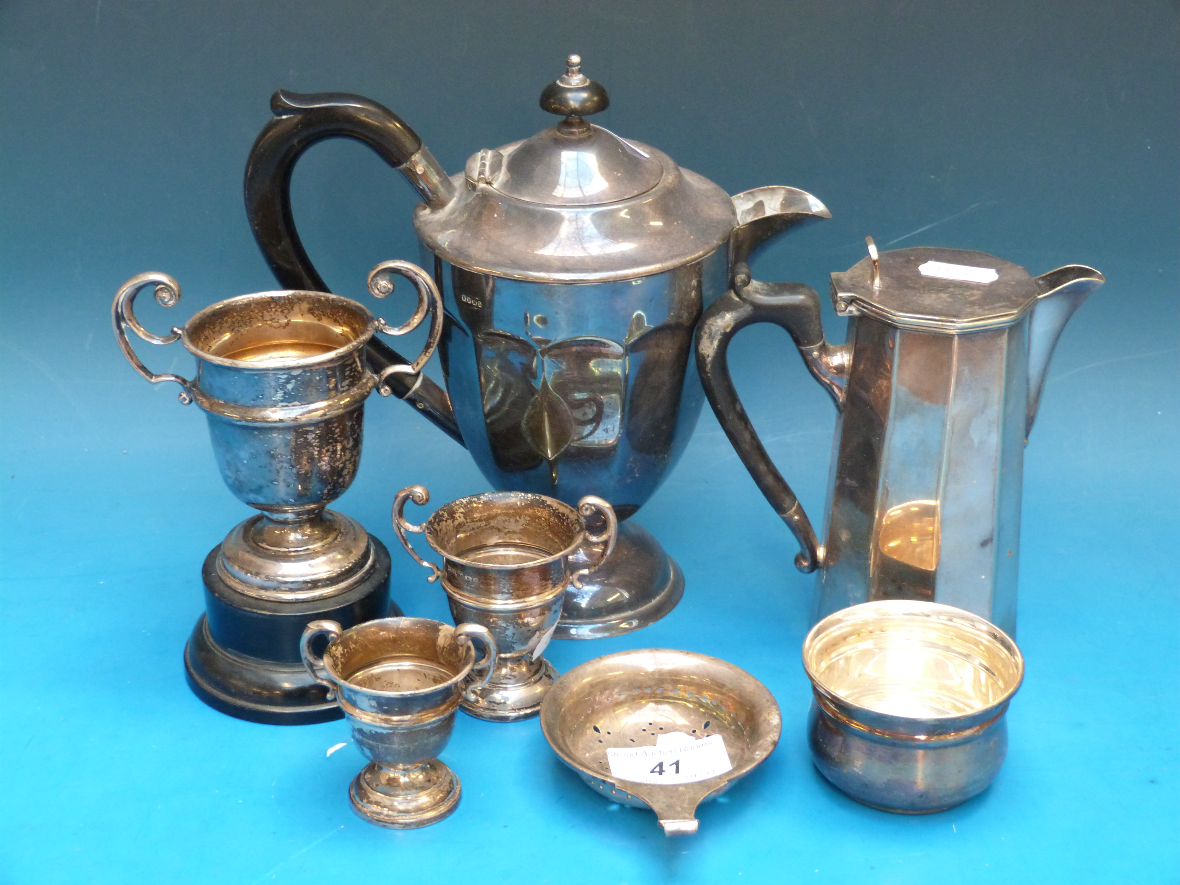 A quantity of silver plate including Map