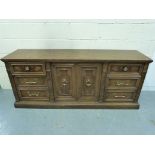 A reproduction sideboard with cupboard f