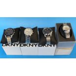 Four DKNY wristwatches, three with chron