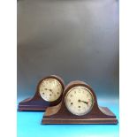 Two Napoleon hat cased mantel clocks wit