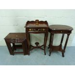 A collection of brass inlaid side tables