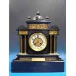 A c1909 slate mantel clock, presented by
