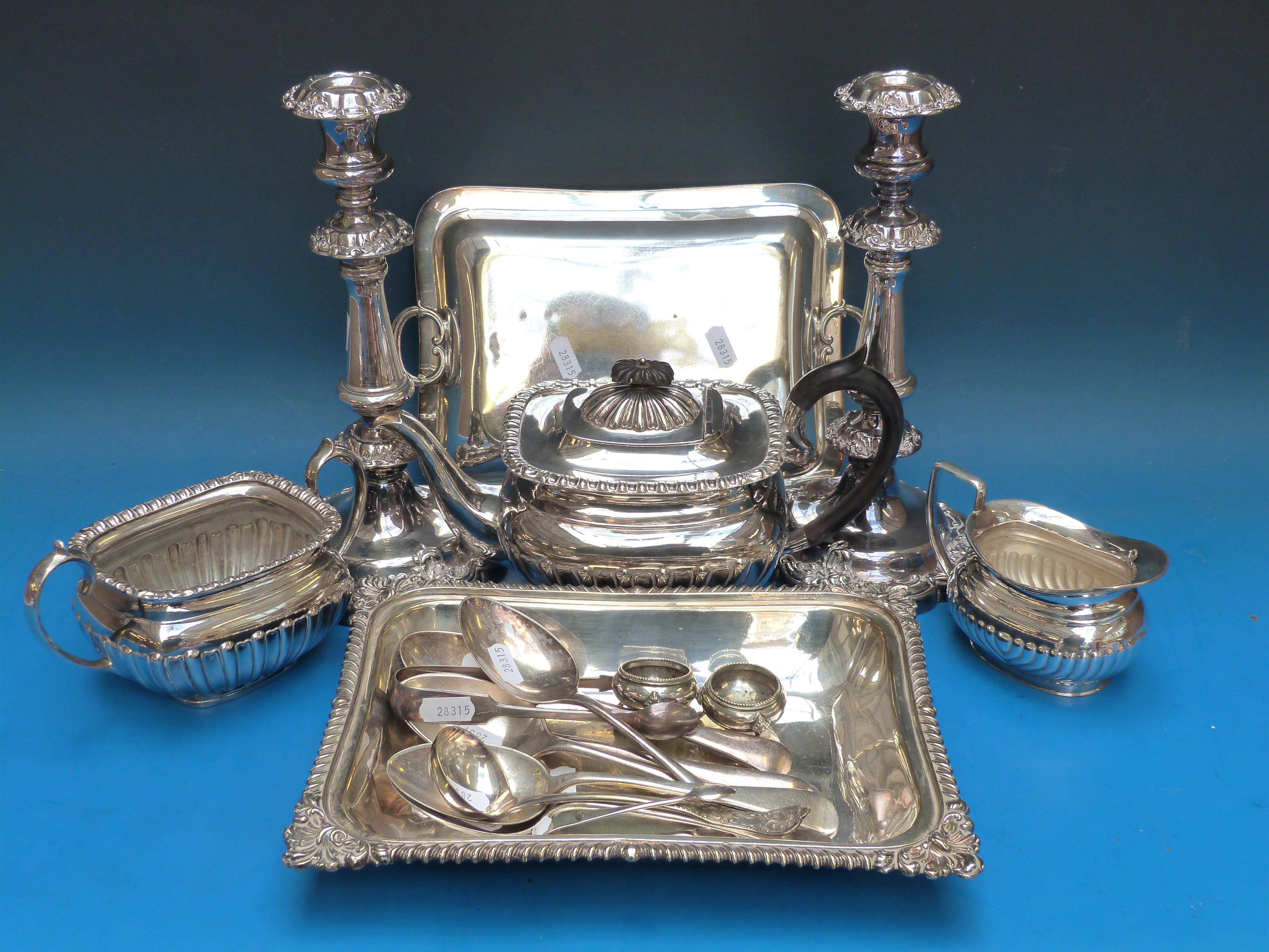 A good pair of 19thC plated candlesticks