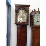 An early 19thC long case clock with eigh