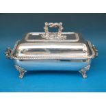 A silver plated food warmer on stand; th