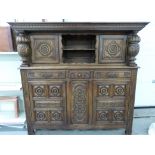 A large carved oak hall cabinet / sidebo