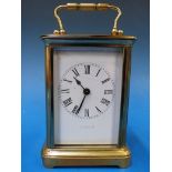 A French brass carriage clock with Roman