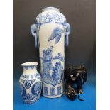 A tall Japanese blue and white vase, a s