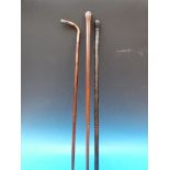 Three walking canes including silver mou