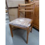 A set of eight golden oak Geneva chairs