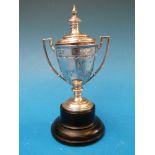 A small hallmarked silver trophy cup on