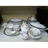 A Royal Albert 24-piece tea set including teapot in "Floral" design, together with an Alfred Meakin