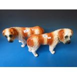A pair of St. Bernard ceramic dogs c1920 with glass inset eyes