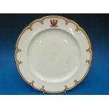 A Russian or Eastern European hand decorated armorial cabinet plate