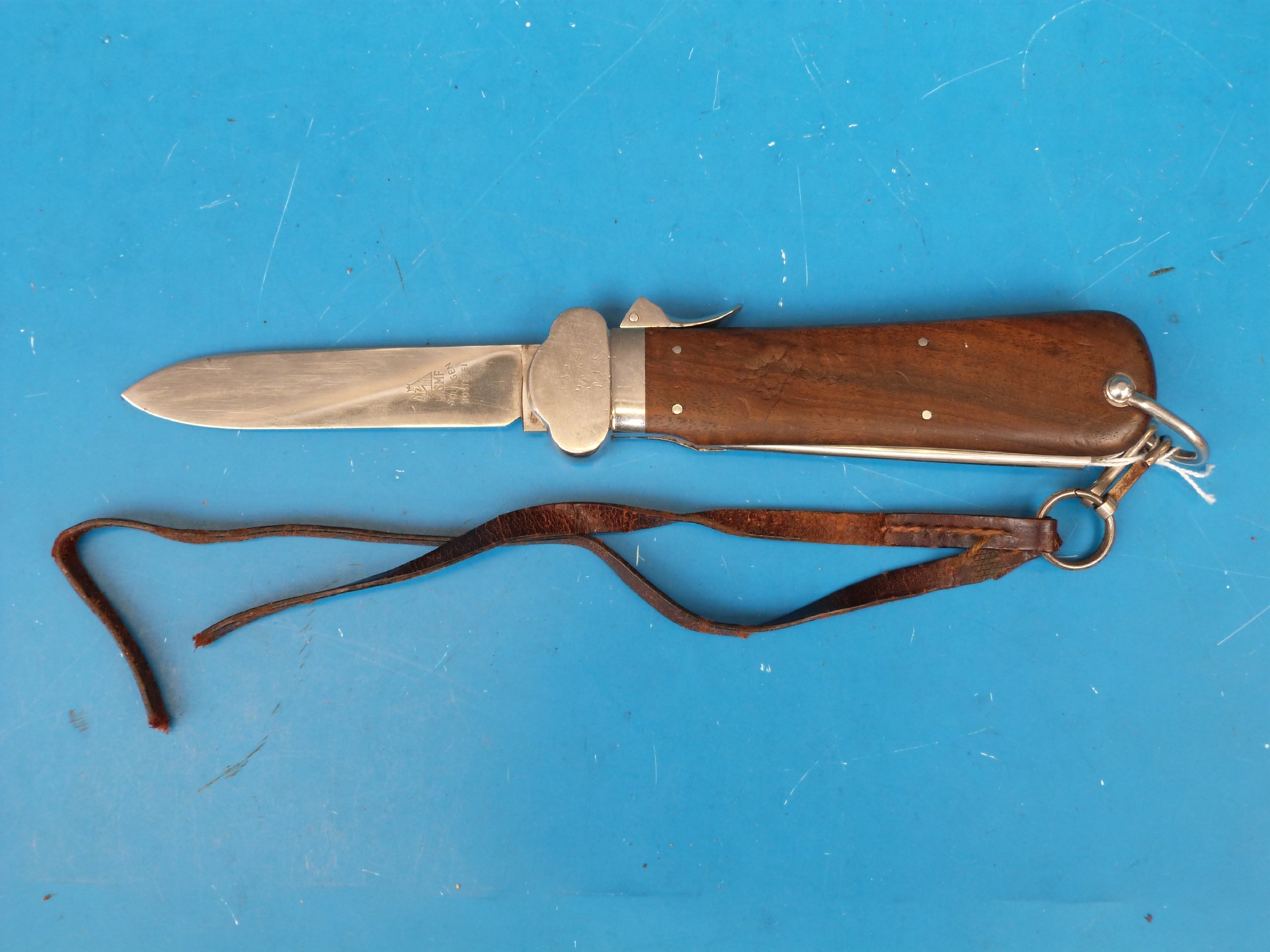 A German Paratroopers SMF Solingen Rostfrei gravity knife with wooden handle, marlin spike and