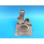 A Black Forest desk stand with bear figure