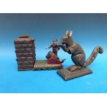 A cast metal Artillery Bank money box and a squirrel nutcracker