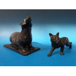 A bronze coloured sculpture of a badger by Addison  together with another of a fox