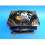A lacquer bombe-shaped tea caddy with hand-painted floral scene inlaid pearl and gilt decoration