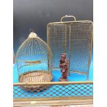 A vintage birdcage, folding fireguard,