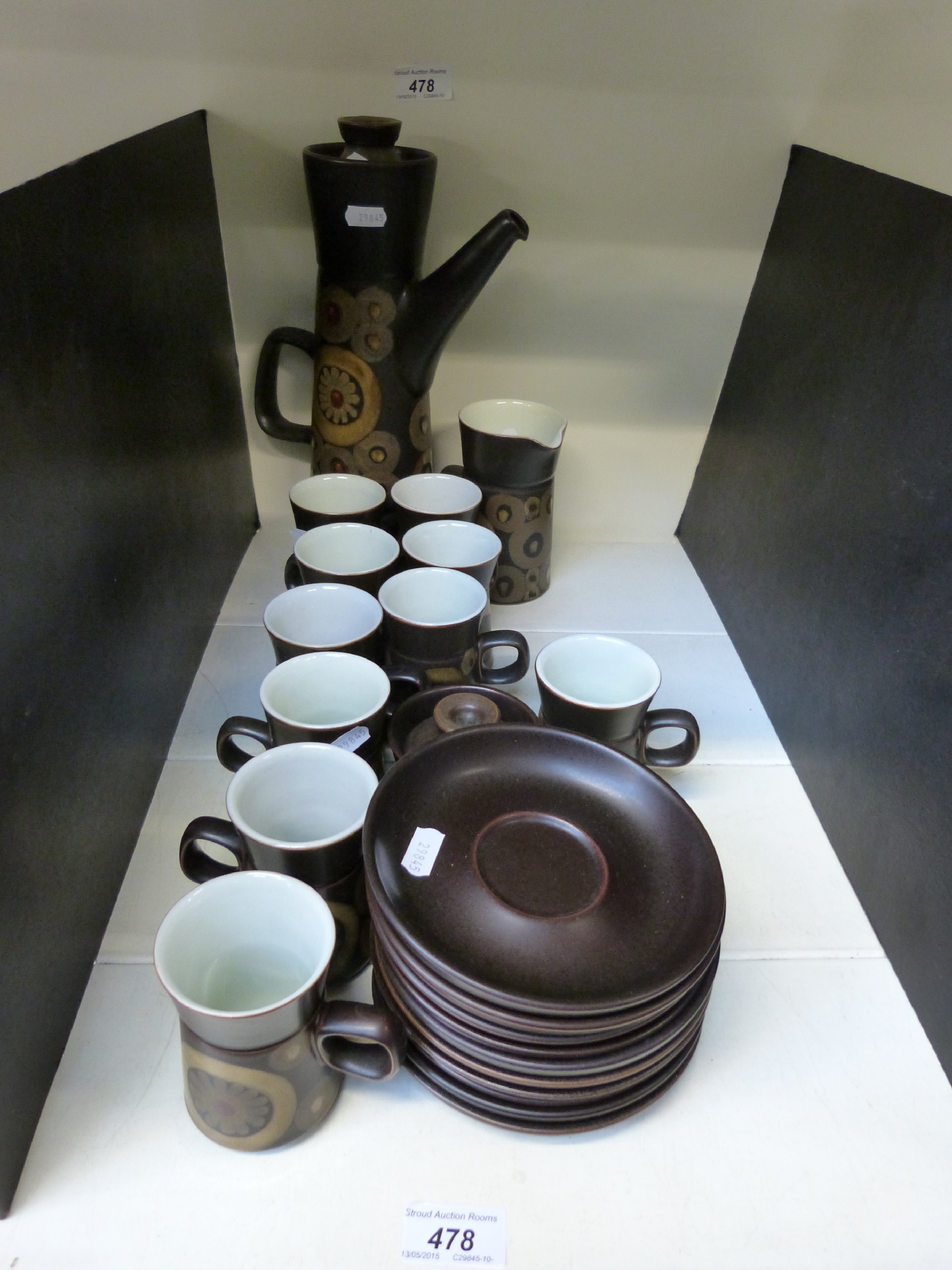 A Denby coffee set in the "Arabesque" pattern (ten mugs and saucers)
