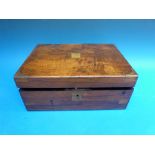 A late Victorian burr walnut work box with brass corner mounts and writing slope