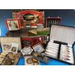 A quantity of plated cased cutlery, collectable tins,