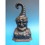 A 19th / 20thC figural cast iron doorstop