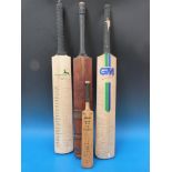A collection of cricket bats including signed examples and a miniature example by Australian